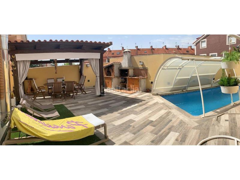 Foto b4b12456-8606-4fc3-9a0a-aed69359e0e4. Casa adossada amb calefacció aparcament piscina a Cabanillas del Campo