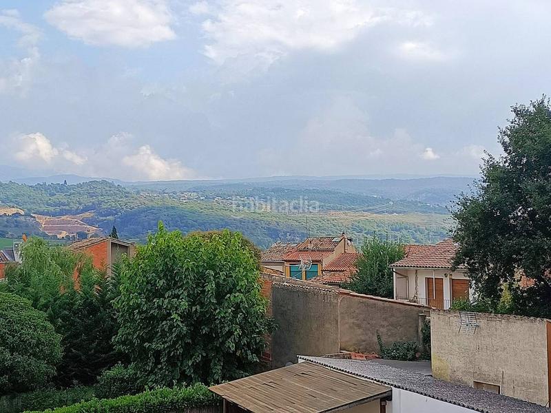 Foto f1b30d43-9c70-4b92-98e8-c3fddbcb00b0. Casa  con jardín en venta en el centro en Centelles