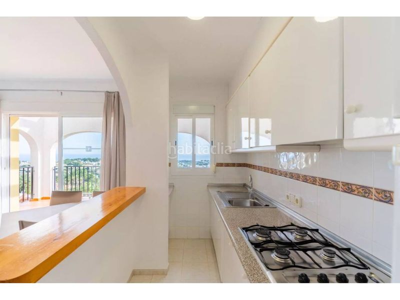 Foto 1bf108f7-bb6e-4d39-bc47-73c20ecb2a12. Semi detached house in calle tosal de la Cometa 1h in Calp