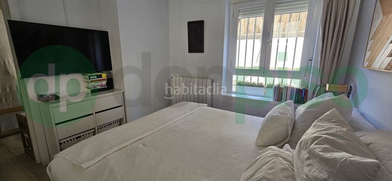 Foto 06ea6df0-f3e2-42a9-873d-07df41e49dab. Planta baixa amb calefacció aparcament a Nueva España Madrid