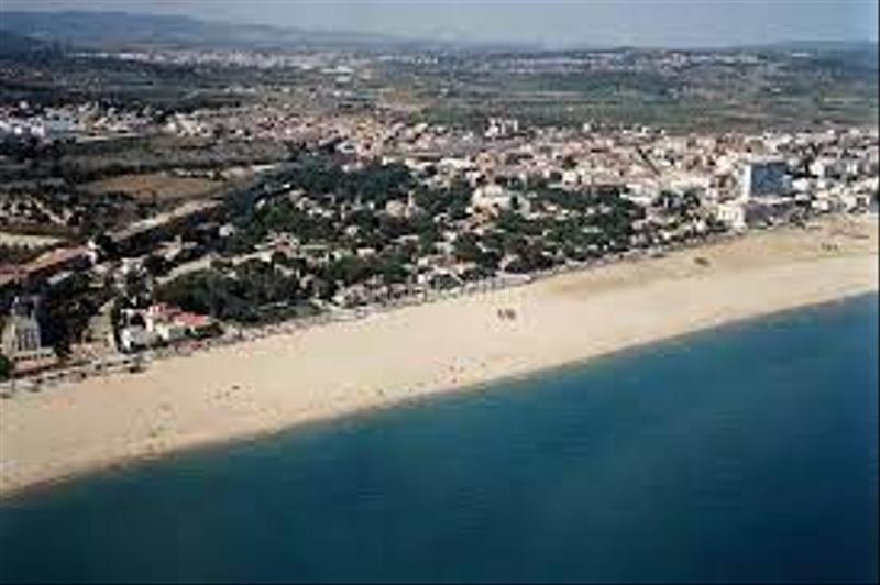 Foto 1fdfc909-4920-454c-89a7-6e248fe37bba. Casa aparellada amb aparcament piscina a Els Masos - Els Garrofers Coma-ruga