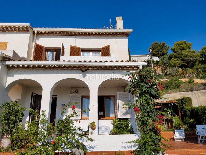 Foto c892c98c-4688-41c9-af5c-9f1c250e2d6a. Casa aparellada amb aparcament piscina a Els Masos - Els Garrofers Coma-ruga