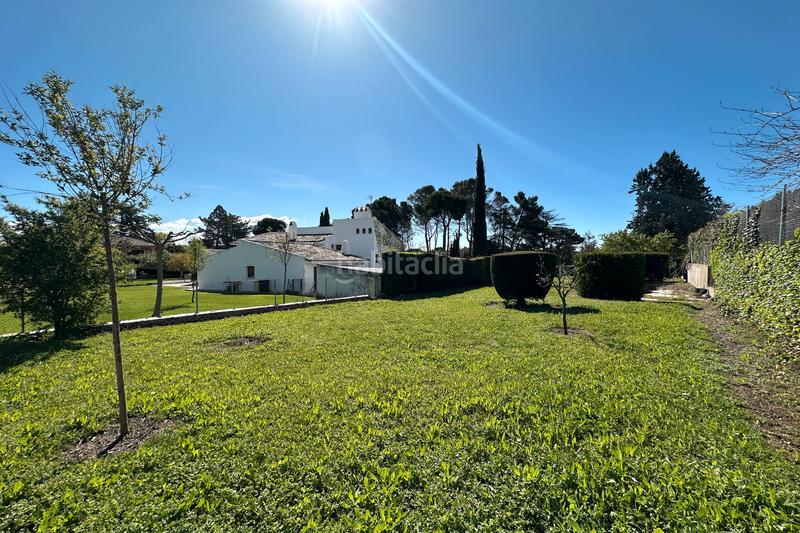 Foto 7ccbce55-c33f-42c7-b270-9781cf186676. Casa amb xemeneia aparcament piscina a Somosaguas Pozuelo de Alarcón