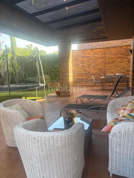 Foto a37f1b61-8d55-4977-b3b4-e82b152ce080. Casa aparellada amb xemeneia piscina a Castillo-Campodón Villaviciosa de Odón