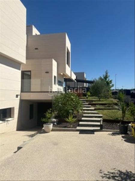 Foto b8e5f26b-2577-44e1-a86e-f7cdde8b1c41. Chalet with fireplace heating parking pool in Los Satélites-Roza Martín Majadahonda