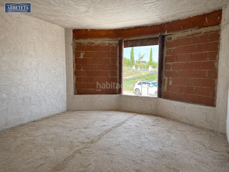 Foto adeaec53-8dde-43da-96c8-0d3f6abef604. Casa adossada amb aparcament a Yebes - pueblo Yebes