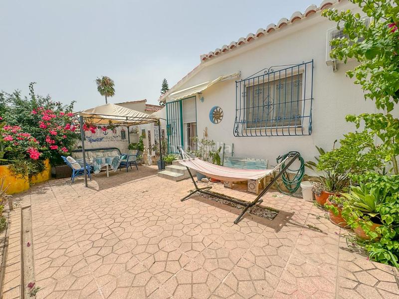 Foto 98e26bb0-ffac-4b2a-a55f-509b19d3eefd. Casa chalet independiente a 200m de la playa en els poblets ideal inversión turísticapresentamos este encantador chalet independiente en Poblets (els)
