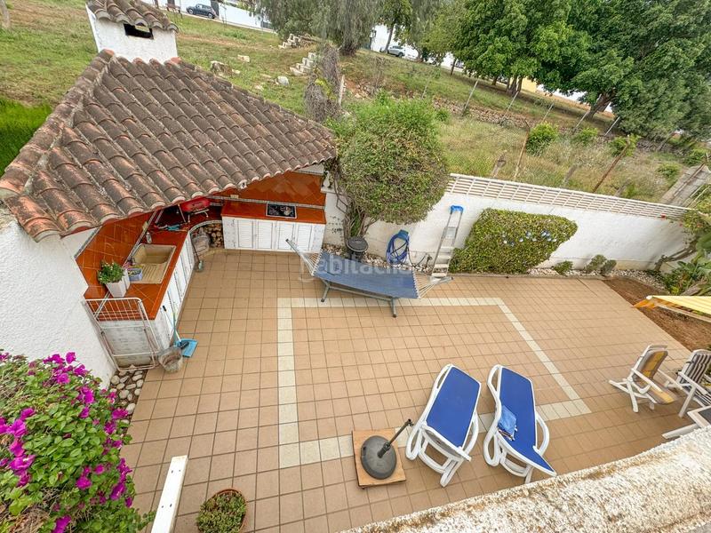 Foto 3e5f1bd1-8009-40c6-bd2a-57244234bee4. Casa adosada encantador chalet pareado en urbanización con piscina comunitaria a un paso del casco urbano.bienvenido a tu nuevo hogar! este her en Dénia