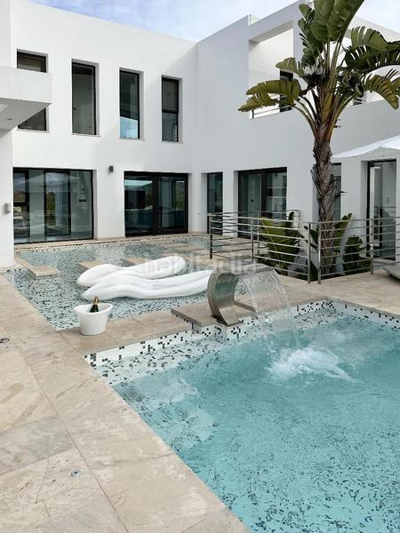 Foto 98e7f5a0-ee08-49f9-8531-42e79b3e73b7. Casa con piscina in Casa de Campo Madrid