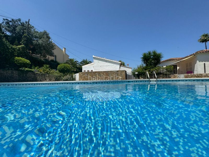 Foto 13a1a527-ce7a-4d9e-b9ad-fe87d474e003. Casa adossada amb piscina a El Montgó Dénia