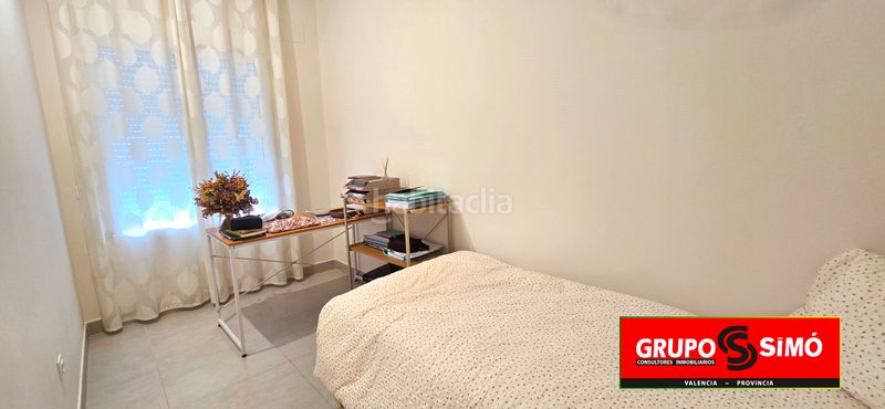 Foto b509a1be-e85e-4135-a60b-8778ea14a4af. Casa adossada amb aparcament piscina a Benissanó
