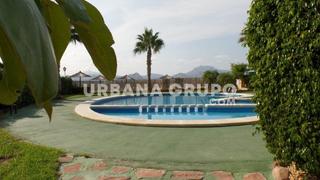Casa adossada  Calle ressol. Vivienda con amplia terraza y vistas al campo de golf