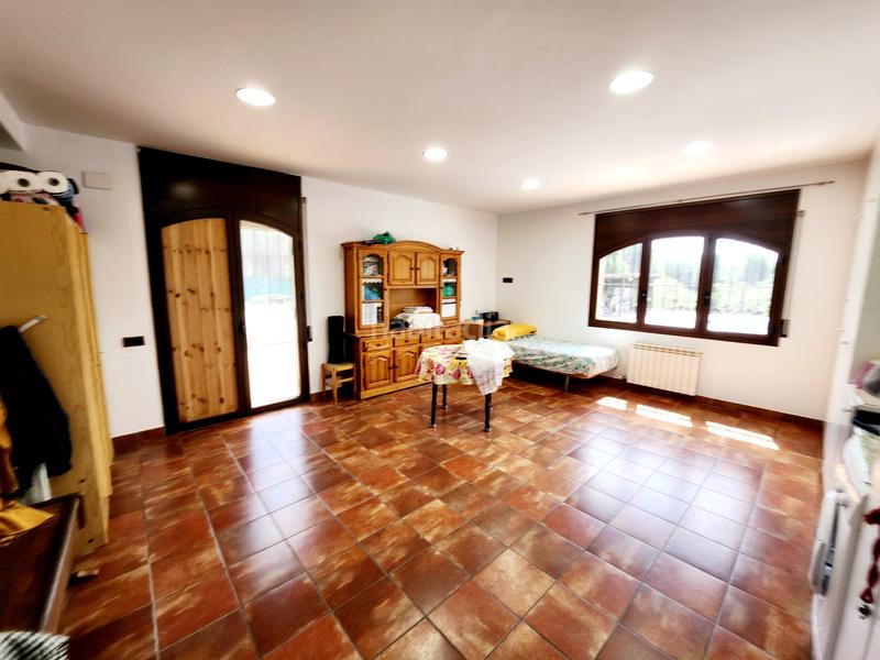 Foto 1555bbf8-c8cd-41b2-8453-f171fc087c16. Rent country house with fireplace heating parking pool in Esparreguera