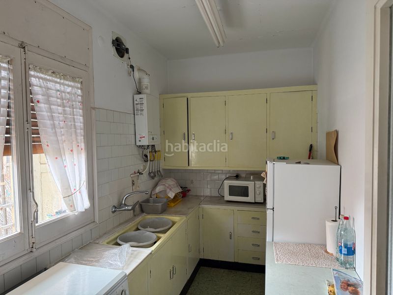 Foto f5aad699-0504-417e-b6e5-f5424acc66f5. Casa aparellada amb aparcament a Torelló