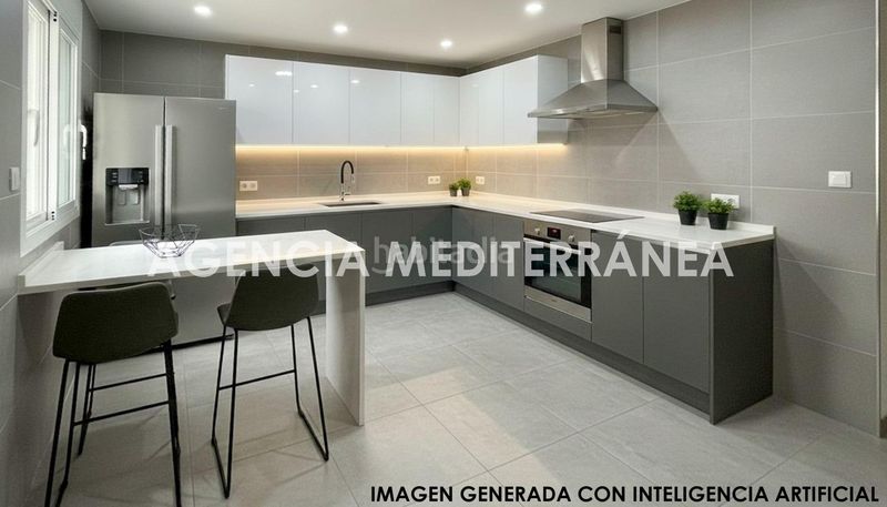 Foto 15c38c5f-4193-4bf0-a7a2-fc619c306bcd. Casa amb aparcament a playa puerto de Sagunto Sagunt