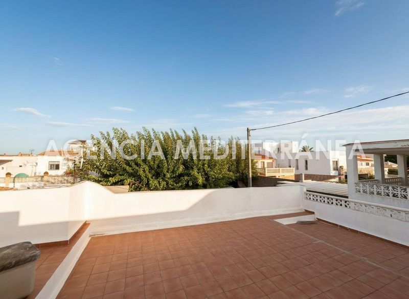 Foto f4f83fc7-be79-48c2-90e5-74114f69e901. Casa adossada a Oliva nova Oliva