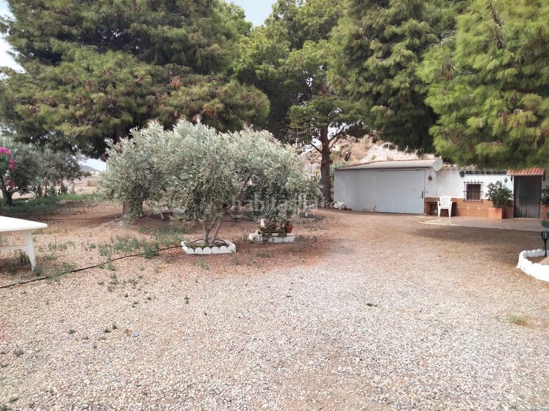 Foto 67069f56-48da-4e4d-8576-4a2fe01da0fc. Masia amb xemeneia aparcament a Tébar - Los Arejos Águilas