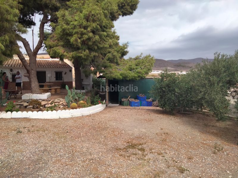 Foto b53d85ad-ad92-4780-abae-9bfd8c21f7d0. Masia amb xemeneia aparcament a Tébar - Los Arejos Águilas