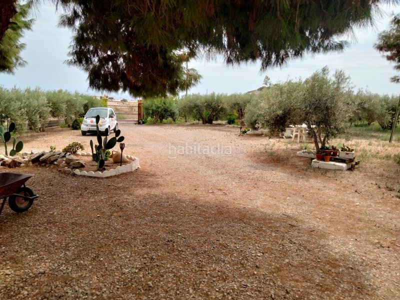 Foto c3804086-6999-43e9-8ed5-7b5d26175e2f. Masia amb xemeneia aparcament a Tébar - Los Arejos Águilas