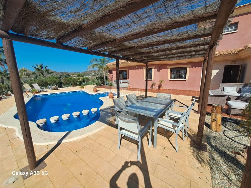 Foto caea6dcd-8b23-45b8-af21-cde8453b6aca. Xalet amb xemeneia calefacció piscina a Garrobillo Lorca