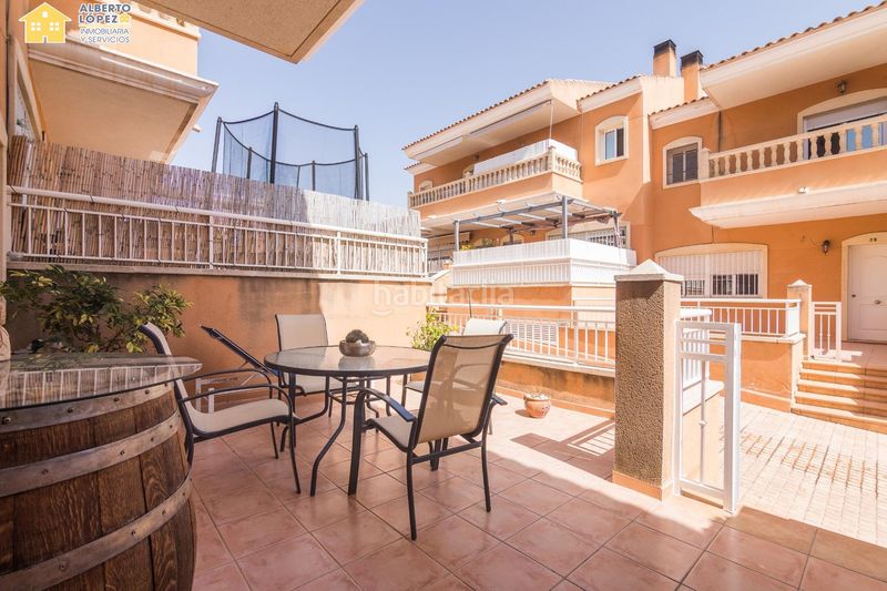 Foto 1d7436c4-9c71-4bf6-8b9f-bb4522ddbdee. Casa adossada amb aparcament piscina a Los Arenales del Sol Elche / Elx