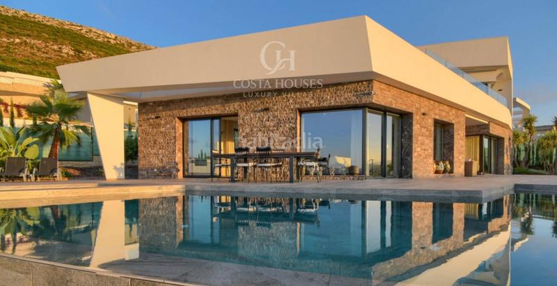 Foto 24ad0daa-a4da-4854-b727-cb3173adee19. Chalet villa nueva con vistas al mar en venta en monte olimpo, jávea alicante en Xàbia