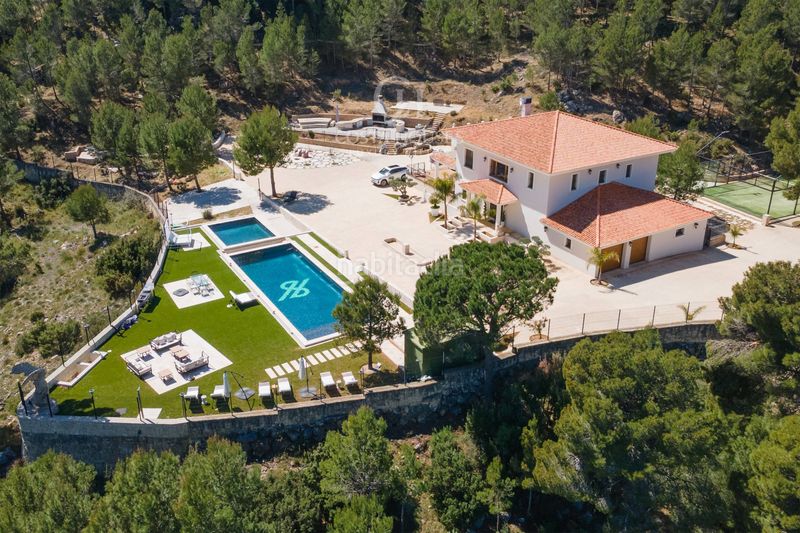 Foto da4c9a1c-f01d-4124-9114-15299fa48ffb. Xalet amb calefacció aparcament piscina a Benimantell