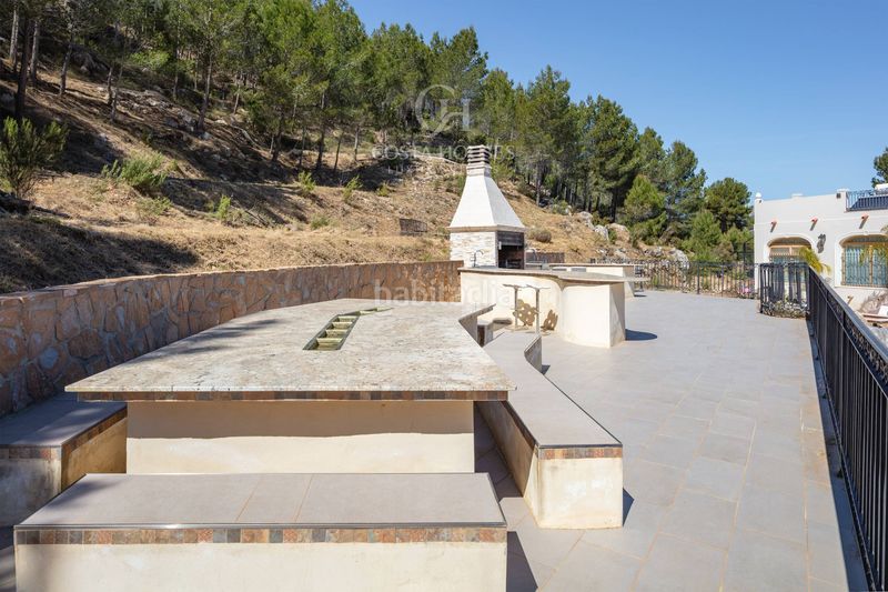 Foto fe279c29-e2d4-49de-89c6-ad51791bf701. Xalet amb calefacció aparcament piscina a Benimantell