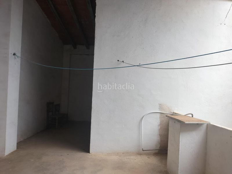 Foto 89b4f03f-5c13-46c3-8b30-ba2f0e7a41f0. Masía casa en el centro de la población de navarres con amplio garaje en Navarrés