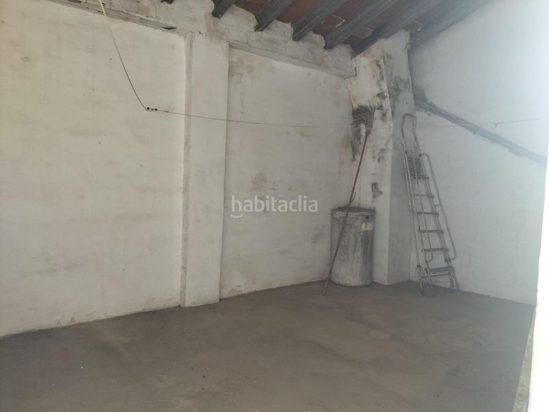 Foto b7dbab59-abbf-4ec8-8b40-cf24f68637c6. Masía casa en el centro de la población de navarres con amplio garaje en Navarrés