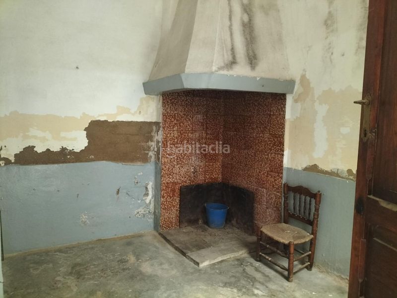 Foto ce5b5c49-7116-494b-bc1f-6fecd9e1c3ae. Masía casa en el centro de la población de navarres con amplio garaje en Navarrés