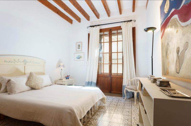 Foto e3c34aa5-e23c-49fa-8d43-112f605a427b. Masía casa adosada de lujo en el corazón histórico en venta en Pollença