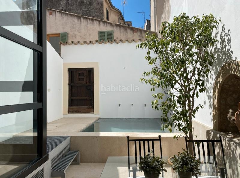 Foto f2a4a521-fde4-4212-9cbc-3fd918f0d9dc. Masía casa adosada de lujo en el corazón histórico en venta en Pollença