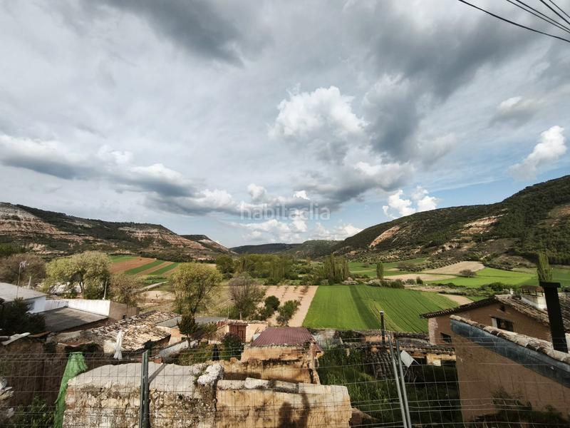 Foto 275d9696-e0e1-47e6-88ee-588d93c81d11. Casa adossada amb xemeneia calefacció a Utande