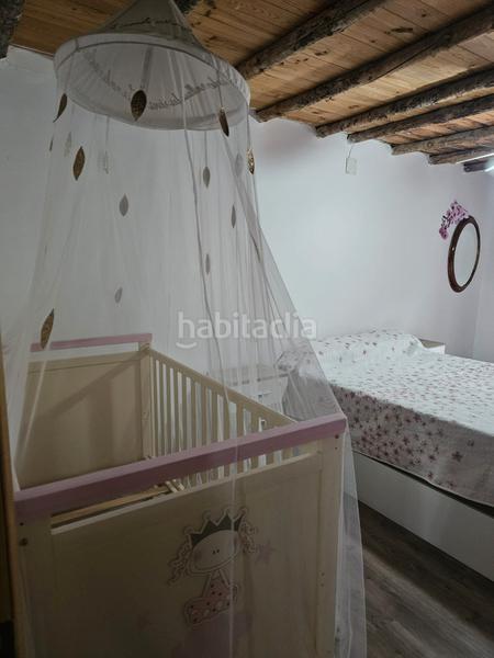 Foto 3b90e106-77e5-469c-bd34-5ed67c8656c0. Casa adossada amb xemeneia calefacció a Utande