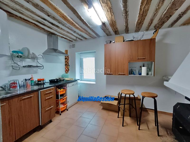 Foto e6947db0-a349-449c-a597-7add2b2643cd. Casa adossada amb xemeneia calefacció a Utande