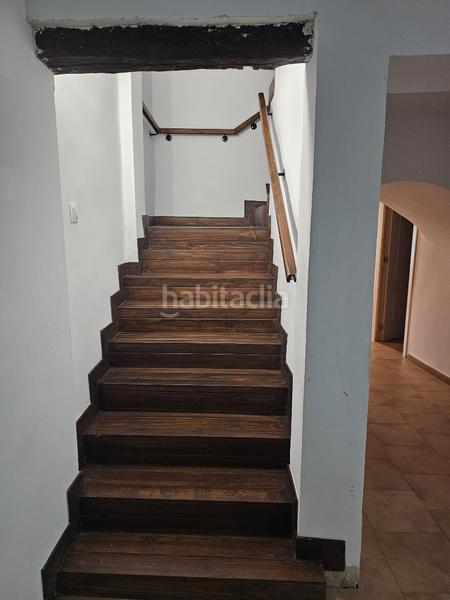 Foto f35c2557-0ef6-42b5-a200-2627b78d717a. Casa adossada amb xemeneia calefacció a Utande