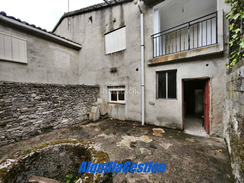 Foto 4a712be2-7100-4b13-868e-7366cec5620d. Casa adossada amb xemeneia calefacció a Tamajón