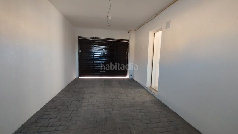 Foto f6e1e07a-f554-4654-874f-28aa6d5b1a19. Casa aparellada amb calefacció a Chiloeches
