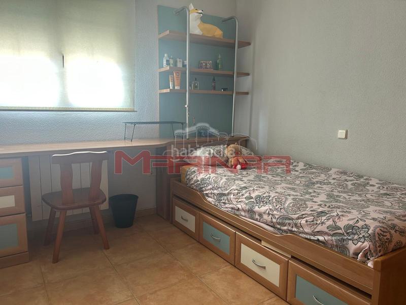 Foto 5399a574-00a8-4d69-8d54-ad679a491277. Casa aparellada amb calefacció aparcament a Los Barreros Seseña