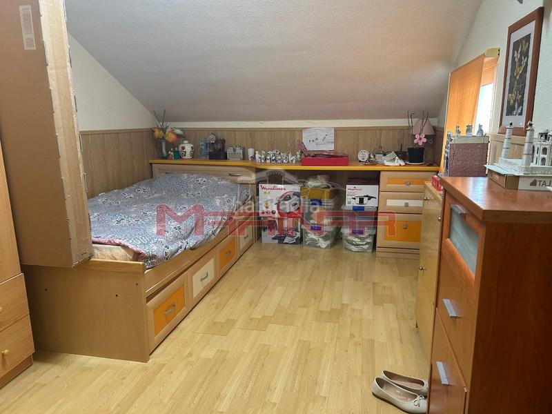 Foto 7b9cd7f3-522f-41a6-8281-3ccc5ecf252c. Casa aparellada amb calefacció aparcament a Los Barreros Seseña