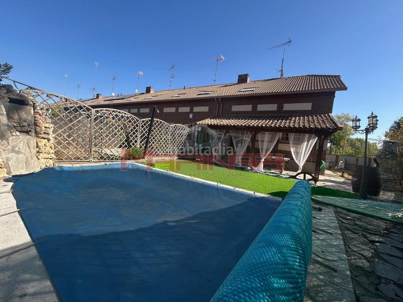 Foto 60eb47f1-dc17-48fd-aa26-5fcf6372cf19. Casa aparellada amb calefacció aparcament piscina a Seseña