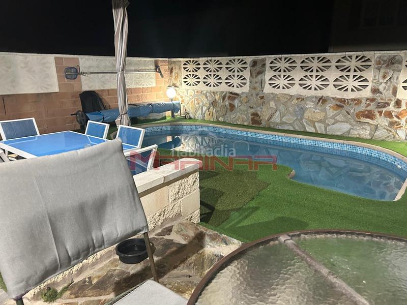 Foto 74b3971e-c320-450a-a289-ca4ee7567c04. Casa aparellada amb calefacció aparcament piscina a Seseña