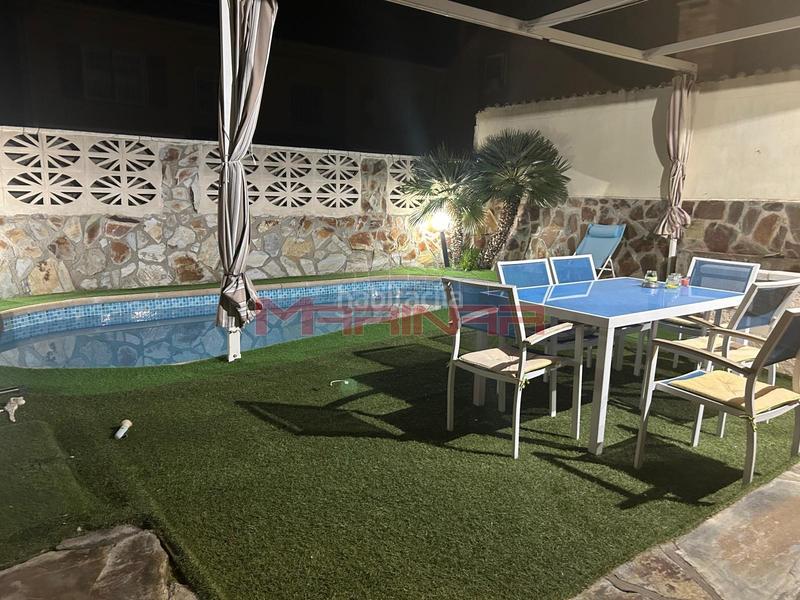 Foto f3eda632-426f-4163-b53d-2c6a8fcde166. Casa aparellada amb calefacció aparcament piscina a Seseña