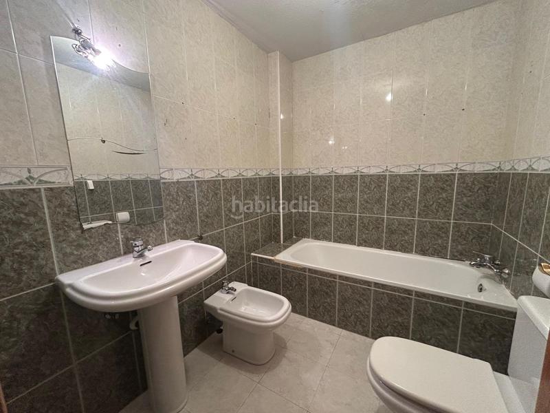 Foto 559295fe-3f5c-488b-807d-8e63ce56d15b. Casa adossada amb calefacció aparcament a Los Robles Seseña