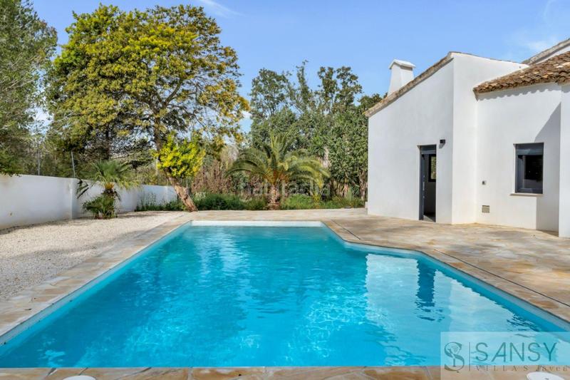 Foto 2a8c0372-d0ce-4a89-b9aa-395184be49b6. Chalet mit heizung parking pool in La Granadella - Costa Nova Xàbia