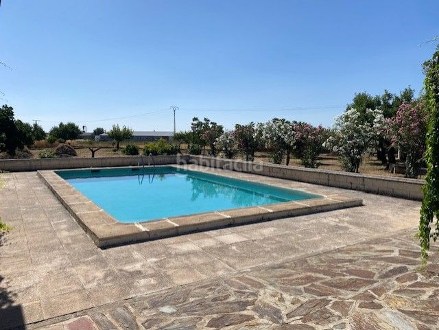 Foto 252e5cc4-57db-43c7-9293-5830ee5af5b6. Masia amb xemeneia calefacció aparcament piscina a Sonseca