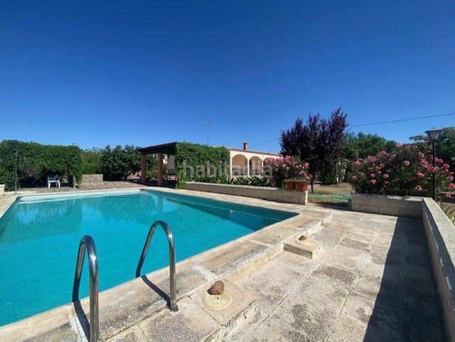 Foto 98987a26-d14c-4e2d-b0e1-01e452927cdc. Masia amb xemeneia calefacció aparcament piscina a Sonseca