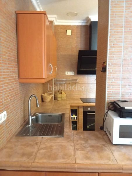 Foto 9546f8cb-8ede-4a85-af46-0a5c38ed2efa. Casa amb xemeneia a Petrer