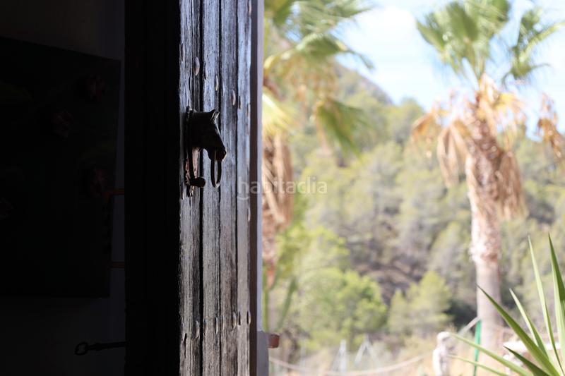 Foto 45b078e9-18da-4e5e-bd1d-de3c26912be8. Masia amb xemeneia calefacció aparcament a Finestrat pueblo Finestrat